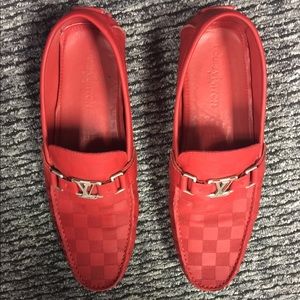 Louis Vuitton loafers.